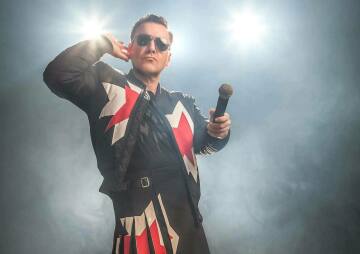AJ as Robbie Williams
